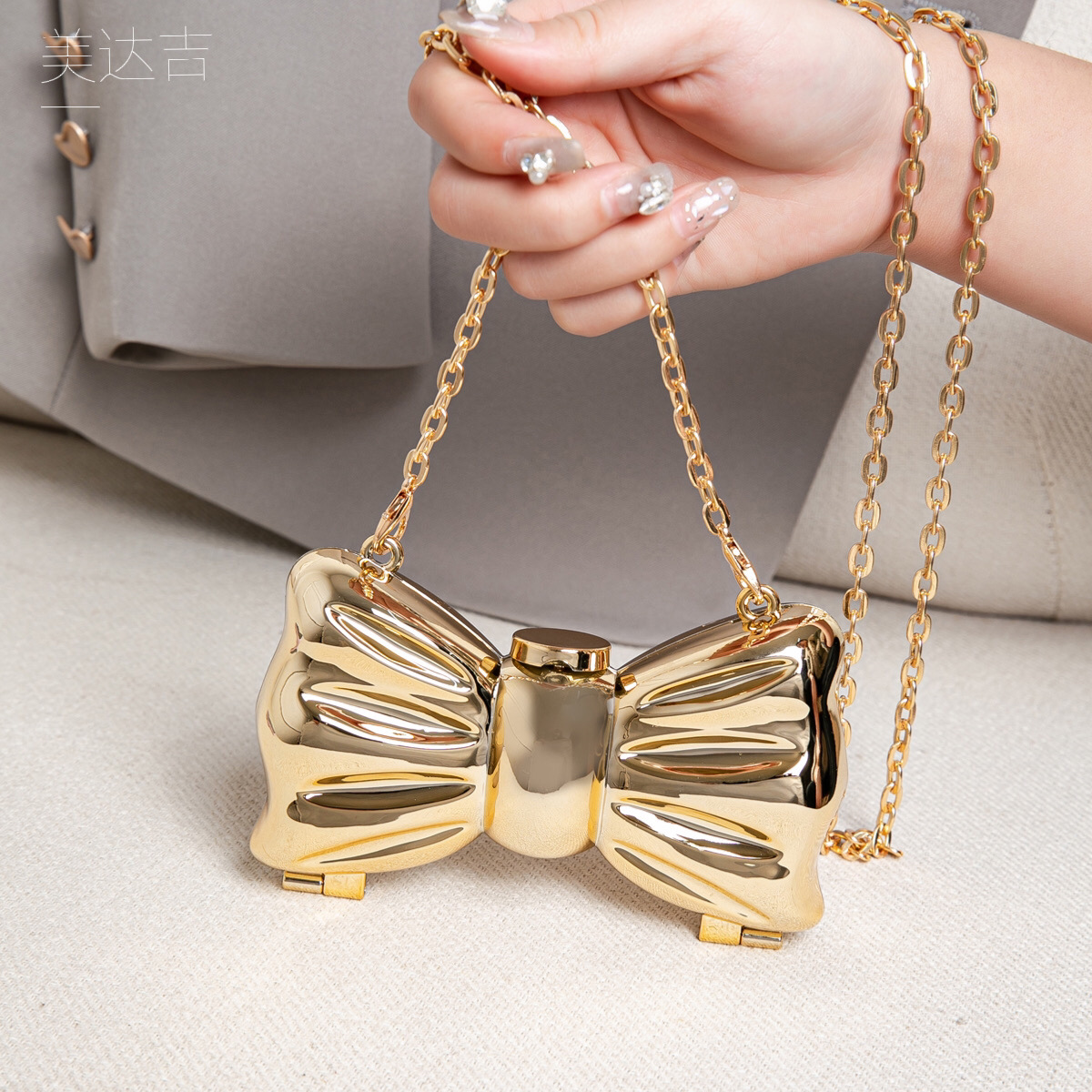 Glossy Gold Metal Bow Shaped M - Mini Purse Chain review and price